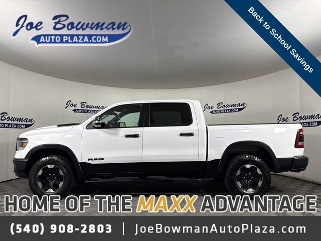 2021 RAM 1500 Rebel Crew Cab 4x4 5'7" Box in White — front three-quarter view